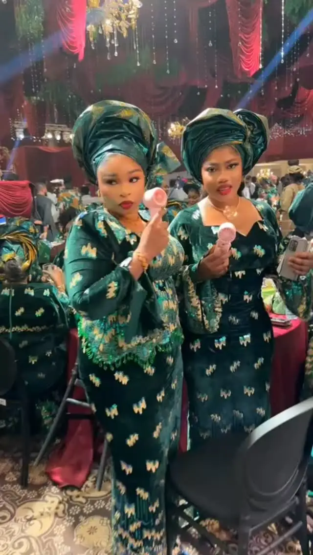 Family aso-ebi in emerald velvet